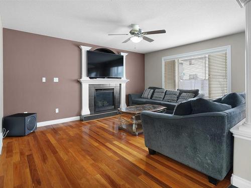 16210 47 Street, Edmonton, AB - Indoor Photo Showing Living Room With Fireplace