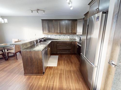 4013 41B Avenue, Drayton Valley, AB - Indoor Photo Showing Kitchen With Stainless Steel Kitchen With Double Sink With Upgraded Kitchen