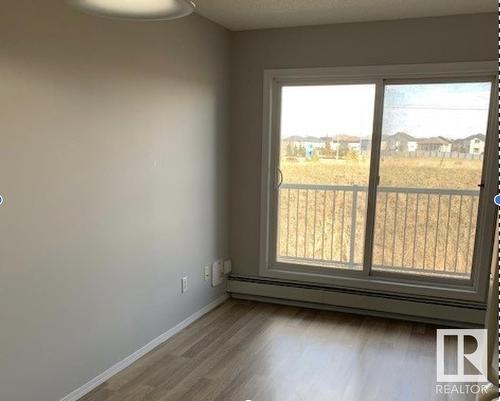 207 70 Woodsmere, Fort Saskatchewan, AB - Indoor Photo Showing Other Room