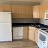 207 70 Woodsmere, Fort Saskatchewan, AB  - Indoor Photo Showing Kitchen With Double Sink 