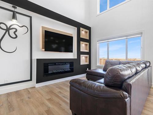 2920 1 Avenue, Edmonton, AB - Indoor Photo Showing Living Room With Fireplace