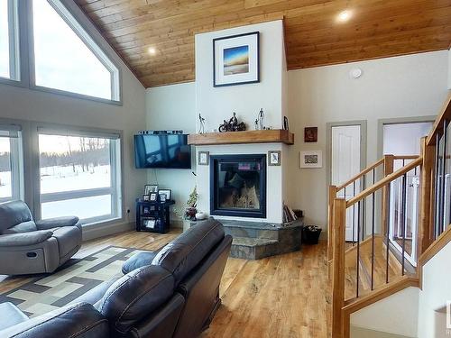 18121 Township Road 540, Rural Yellowhead, AB - Indoor Photo Showing Living Room With Fireplace