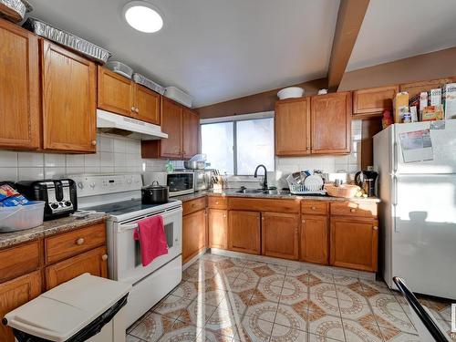 7220 152A Avenue, Edmonton, AB - Indoor Photo Showing Kitchen With Double Sink