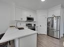 621 Glenridding Ravine Drive, Edmonton, AB  - Indoor Photo Showing Kitchen With Stainless Steel Kitchen With Double Sink With Upgraded Kitchen 