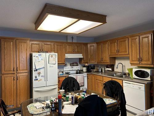 5138 47 Street, Redwater, AB - Indoor Photo Showing Kitchen With Double Sink