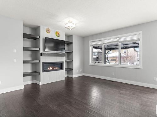 8719 218 Street, Edmonton, AB - Indoor Photo Showing Living Room With Fireplace