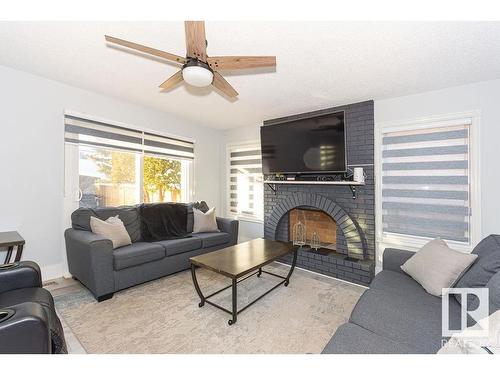 15828 98 Street, Edmonton, AB - Indoor Photo Showing Living Room With Fireplace