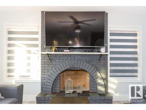 15828 98 Street, Edmonton, AB - Indoor Photo Showing Living Room With Fireplace