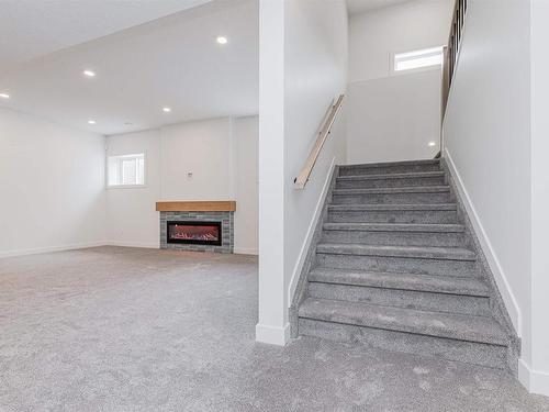 51 Jubilation Drive, St. Albert, AB - Indoor Photo Showing Other Room With Fireplace