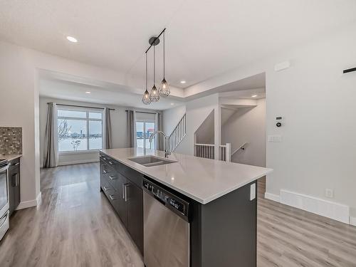 48 1010 Rabbit Hill Road, Edmonton, AB - Indoor Photo Showing Kitchen With Stainless Steel Kitchen With Double Sink With Upgraded Kitchen