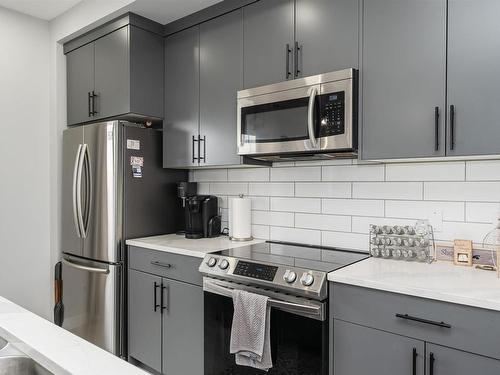 15 Joyal Way, St. Albert, AB - Indoor Photo Showing Kitchen With Stainless Steel Kitchen With Upgraded Kitchen