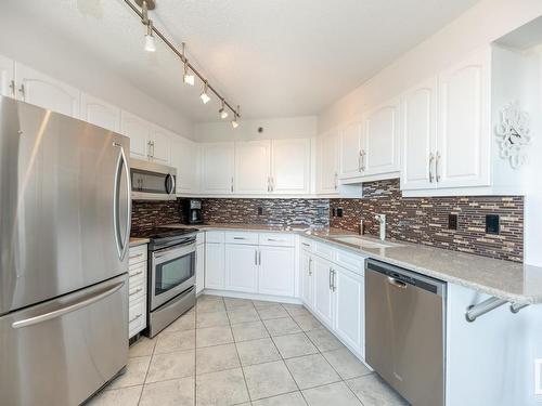 703 12319 Jasper Avenue, Edmonton, AB - Indoor Photo Showing Kitchen With Upgraded Kitchen