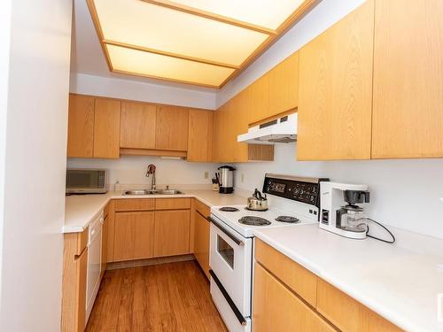 703 12319 Jasper Avenue, Edmonton, AB - Indoor Photo Showing Kitchen With Double Sink