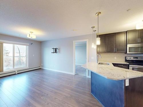 Edmonton, AB - Indoor Photo Showing Kitchen With Stainless Steel Kitchen With Upgraded Kitchen