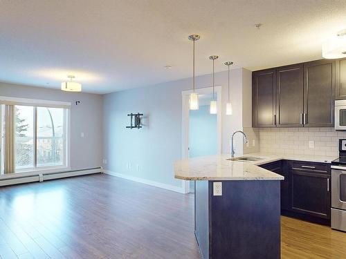 Edmonton, AB - Indoor Photo Showing Kitchen With Stainless Steel Kitchen With Upgraded Kitchen