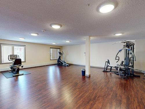 Edmonton, AB - Indoor Photo Showing Gym Room