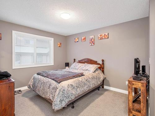 4 12050 17 Avenue, Edmonton, AB - Indoor Photo Showing Bedroom