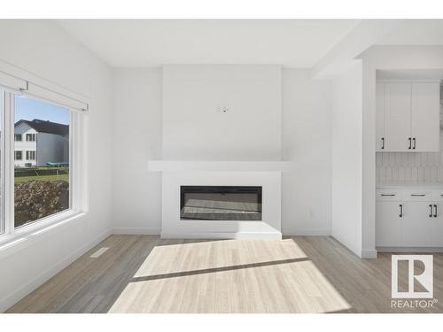 19007 20 Avenue, Edmonton, AB - Indoor Photo Showing Living Room With Fireplace