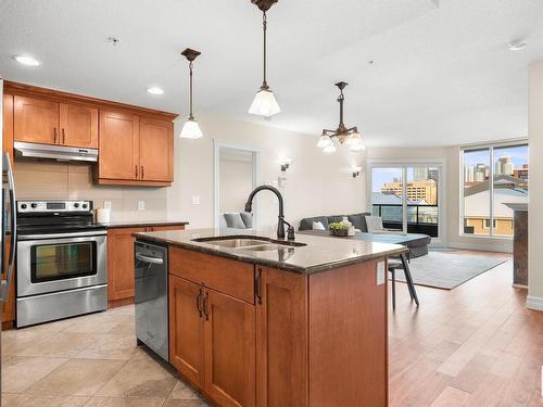 402 10142 111 Street Nw, Edmonton, AB - Indoor Photo Showing Kitchen With Stainless Steel Kitchen With Double Sink