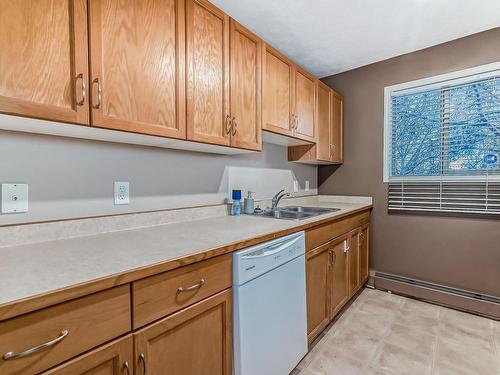 Edmonton, AB - Indoor Photo Showing Kitchen With Double Sink