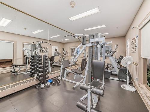 Edmonton, AB - Indoor Photo Showing Gym Room