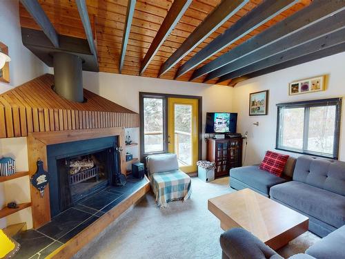 920 1St Avenue S, Rural Parkland County, AB - Indoor Photo Showing Living Room With Fireplace