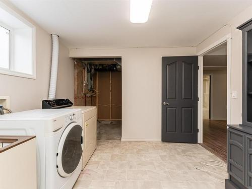 8709 99 Avenue, Morinville, AB - Indoor Photo Showing Laundry Room