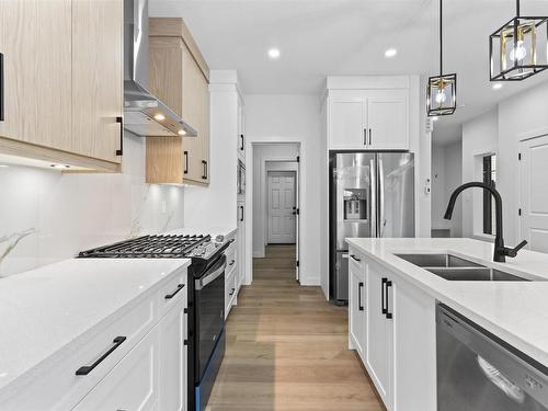 213 Kettyl Court, Leduc, AB - Indoor Photo Showing Kitchen With Double Sink With Upgraded Kitchen