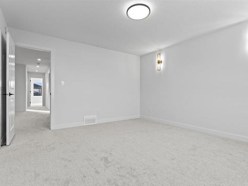 213 Kettyl Court, Leduc, AB - Indoor Photo Showing Other Room