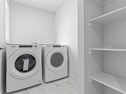 213 Kettyl Court, Leduc, AB - Indoor Photo Showing Laundry Room