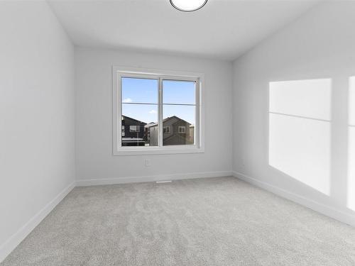 213 Kettyl Court, Leduc, AB - Indoor Photo Showing Other Room