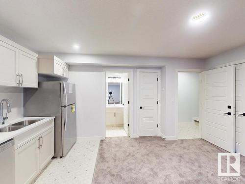 32 Rosewood Way, St. Albert, AB - Indoor Photo Showing Kitchen With Double Sink