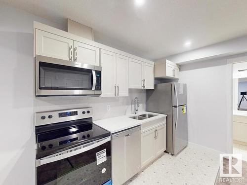 32 Rosewood Way, St. Albert, AB - Indoor Photo Showing Kitchen With Stainless Steel Kitchen With Double Sink