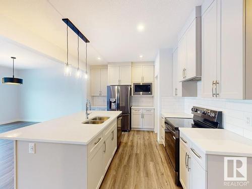 32 Rosewood Way, St. Albert, AB - Indoor Photo Showing Kitchen With Stainless Steel Kitchen With Double Sink With Upgraded Kitchen