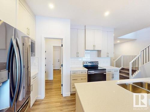 32 Rosewood Way, St. Albert, AB - Indoor Photo Showing Kitchen With Double Sink