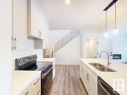 32 Rosewood Way, St. Albert, AB - Indoor Photo Showing Kitchen With Double Sink