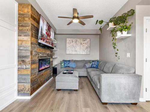 20126 18A Avenue Nw, Edmonton, AB - Indoor Photo Showing Living Room With Fireplace