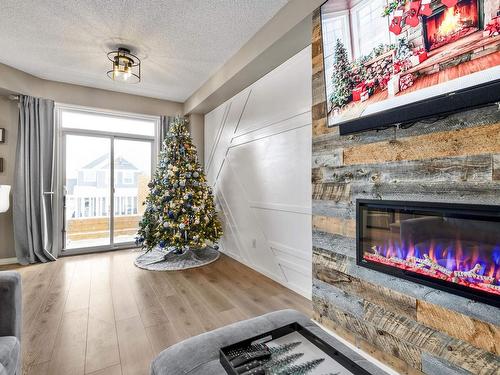 20126 18A Avenue Nw, Edmonton, AB - Indoor Photo Showing Living Room With Fireplace