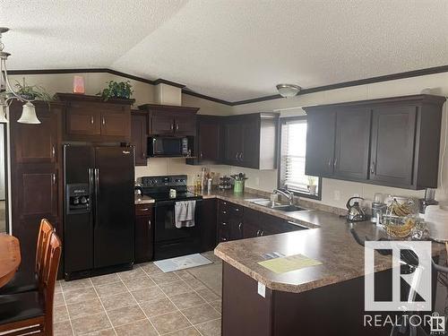 5910 Primrose Road, Cold Lake, AB - Indoor Photo Showing Kitchen With Double Sink