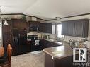 5910 Primrose Road, Cold Lake, AB  - Indoor Photo Showing Kitchen With Double Sink 