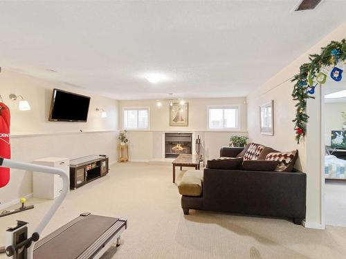 4022 37 Street, Edmonton, AB - Indoor Photo Showing Other Room With Fireplace