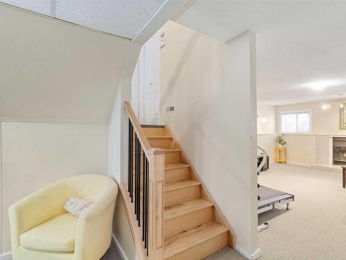 4022 37 Street, Edmonton, AB - Indoor Photo Showing Other Room With Fireplace