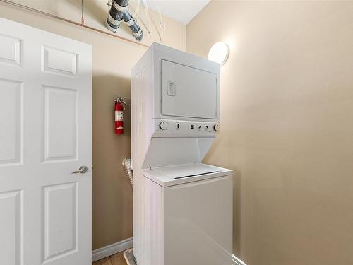 1401 9020 Jasper Avenue, Edmonton, AB - Indoor Photo Showing Laundry Room