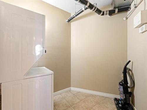 1401 9020 Jasper Avenue, Edmonton, AB - Indoor Photo Showing Laundry Room