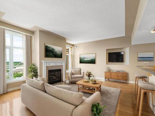 1401 9020 Jasper Avenue, Edmonton, AB - Indoor Photo Showing Living Room With Fireplace