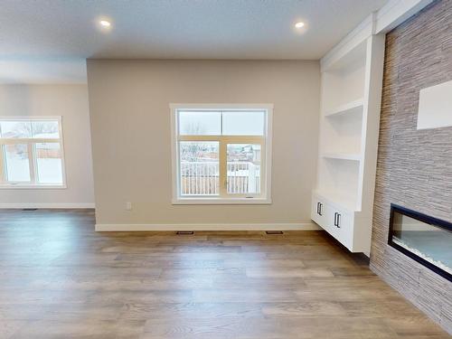 4220 41B Avenue, Drayton Valley, AB - Indoor Photo Showing Other Room With Fireplace