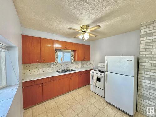 10509 63 Avenue, Edmonton, AB - Indoor Photo Showing Kitchen With Double Sink