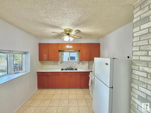 10509 63 Avenue, Edmonton, AB - Indoor Photo Showing Kitchen With Double Sink