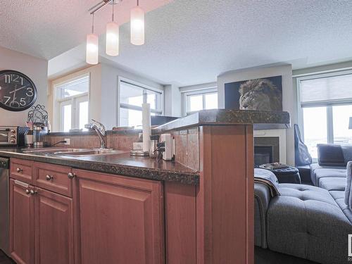 1201 9020 Jasper Avenue Nw, Edmonton, AB - Indoor Photo Showing Other Room With Fireplace