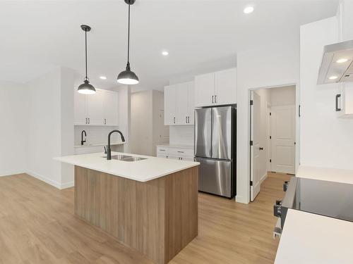 17712 70 Street, Edmonton, AB - Indoor Photo Showing Kitchen With Double Sink With Upgraded Kitchen